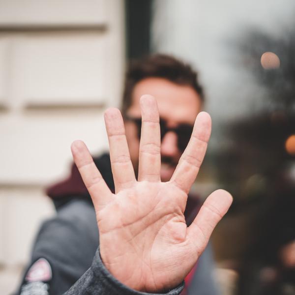 Number 5 shown with hand