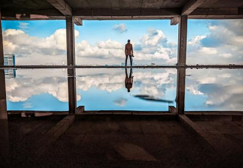 a man looking at a view