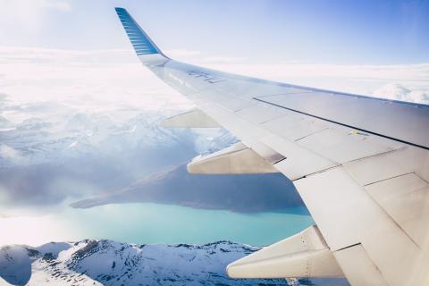 wing of a plane visible through the window